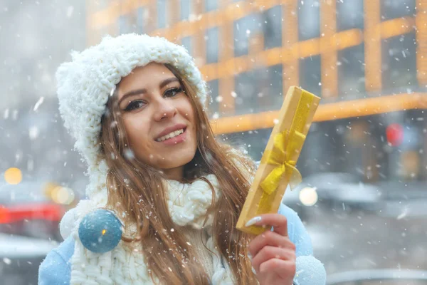 Charming Young Woman Receiving Gift Holiday Winter Fair Space Text — Stock Photo, Image