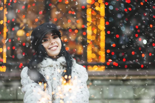 Happy Brunette Woman Enjoying Winter Holidays Sparkling Lights Empty Space — Stock Photo, Image