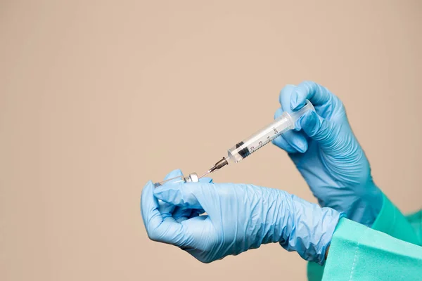Woman Doctor Hands Gloves Holding Syringe Medication Beige Background Empty — Stock Photo, Image