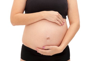 Güzel hamile bir kadının portresi. Müstakbel anne, fit.