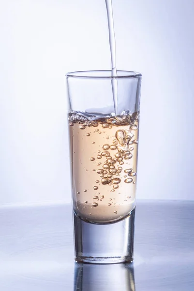 Serving Tequila Crystal Glass Steel Table Tequila Splash — Stock Photo, Image