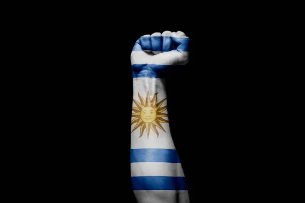 Forte Mano Dell Uomo Nel Segnale Battaglia Con Bandiera Uruguay — Foto Stock