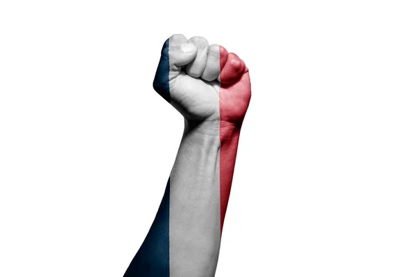 强壮男子的手在白底法国国旗的战斗信号上 — 图库照片