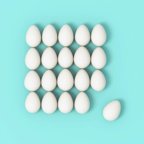 Eggs in rows on turquoise background — Stock Photo, Image