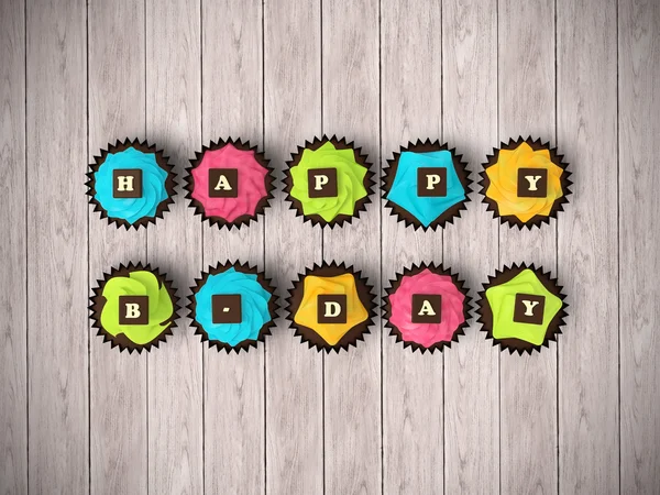 Buon compleanno cupcakes isolato su fondo pavimento in legno — Foto Stock