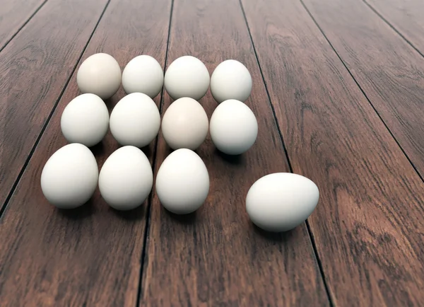 Dozen of eggs on wooden background — Stock Photo, Image