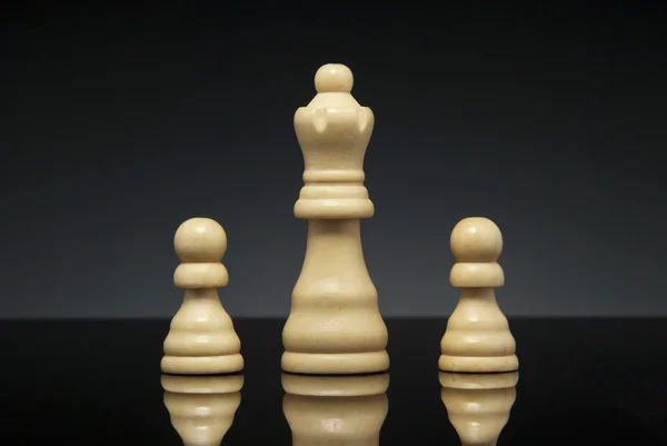 Queen and pawns — Stock Photo, Image