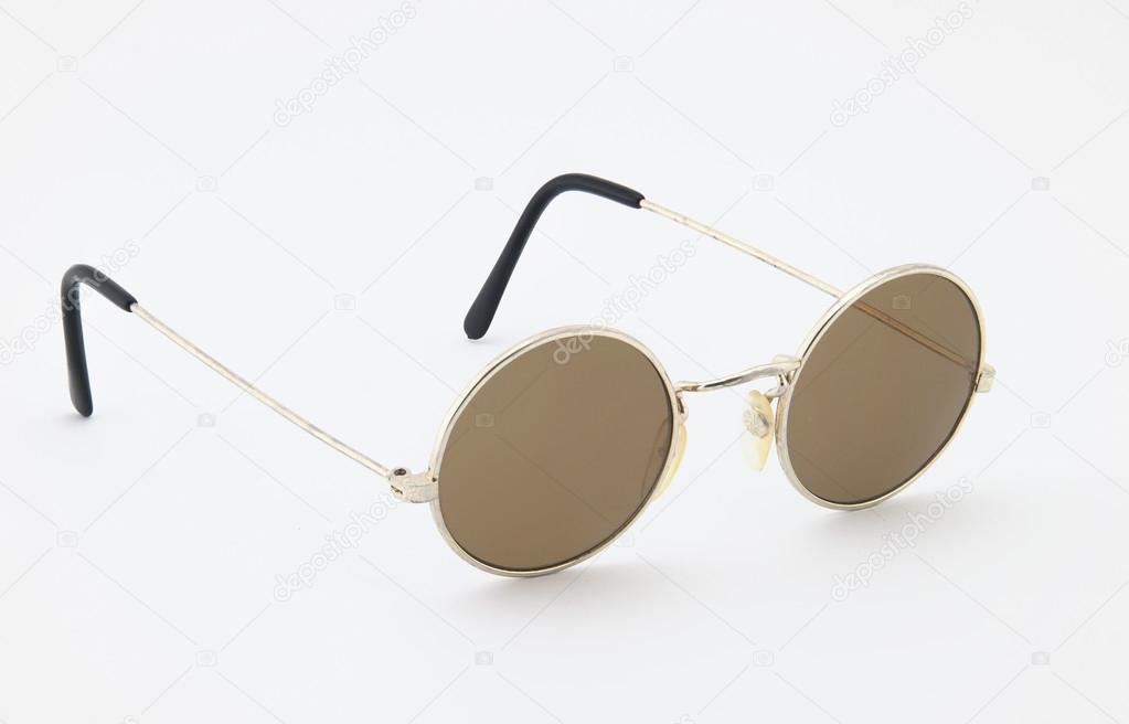 Retro round sunglasses on white background