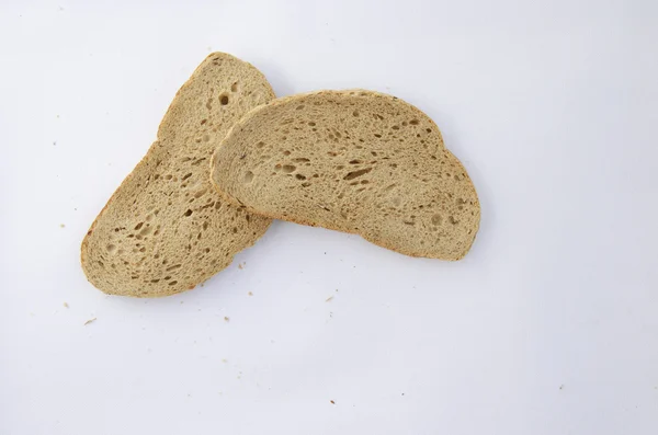 Skivor av bröd bakgrund — Stockfoto