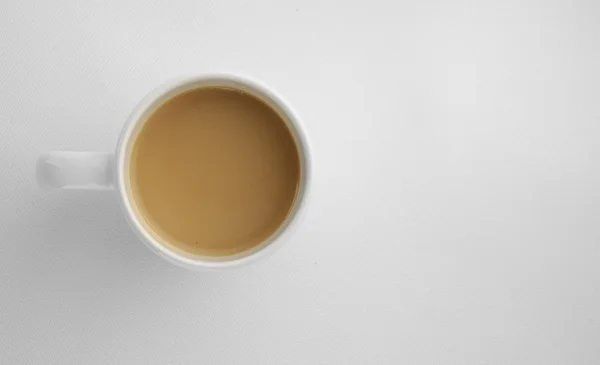 Coffee mug with cappuccino, above view — Stock Photo, Image