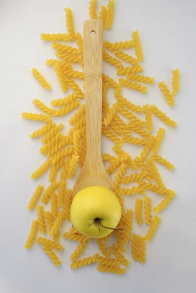 Apple and rotini pasta — Stock Photo, Image