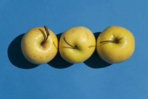 Gula äpplen bakgrund — Stockfoto