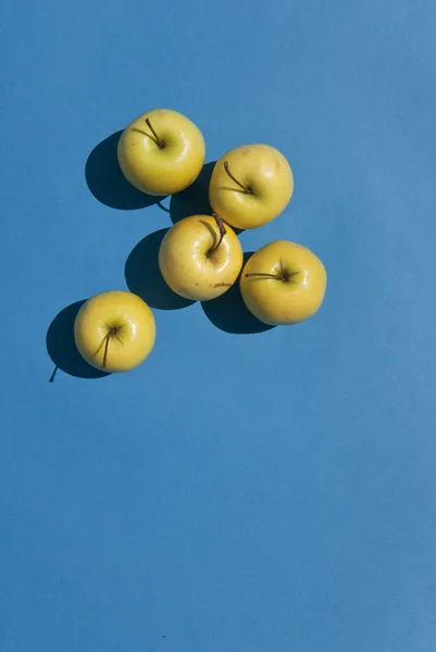 Gula äpplen bakgrund — Stockfoto