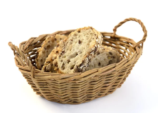 Slices of grain bread in basket — Stock Photo, Image