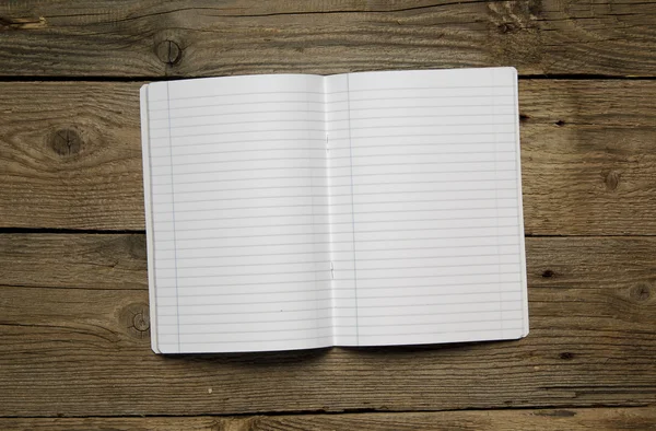 Cuaderno en blanco y diferentes objetos escolares —  Fotos de Stock