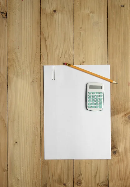 Calculator, blank paper and pencil — Stock Photo, Image
