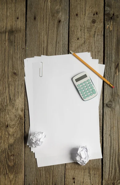 Blank papers, calculator and pencil — Stock Photo, Image