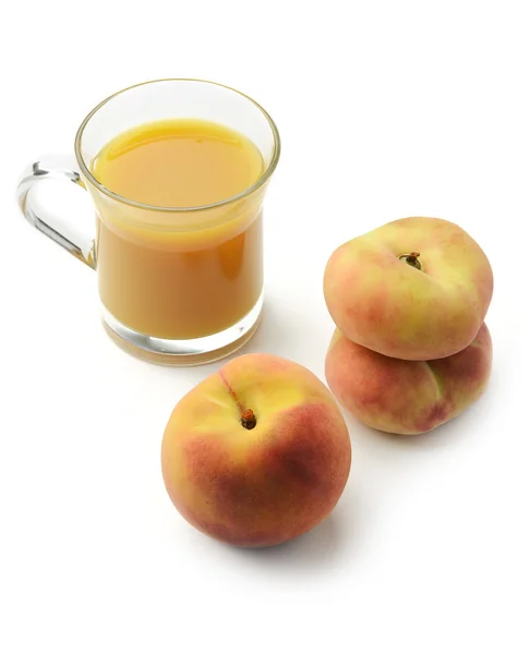 Peaches and fresh juice — Stock Photo, Image