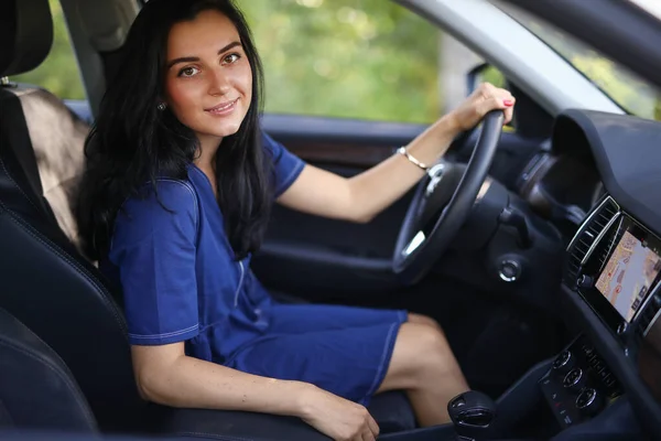 Woman Front Seat Steering Wheel Stock Photo