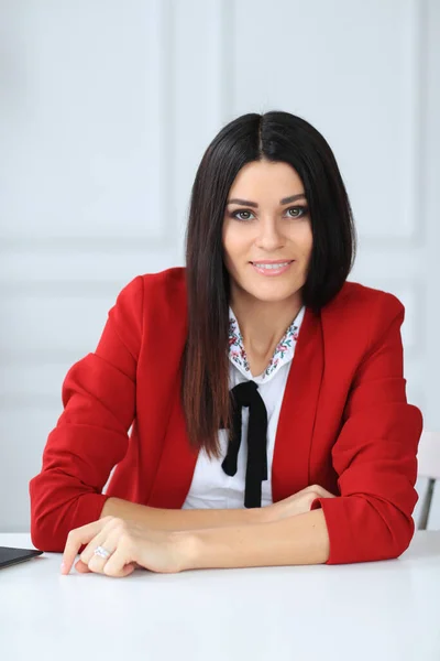 Businesswoman Red Jacket Working Office — стоковое фото