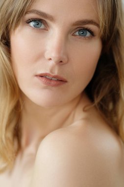 Portrait of beautiful lovely woman with wide smile on white backlground 