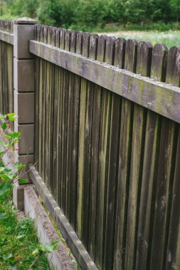 Close-up view of old wooden fence in the village