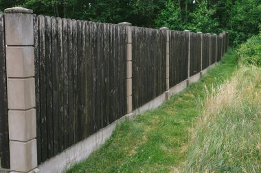 Close-up view of old wooden fence in the village