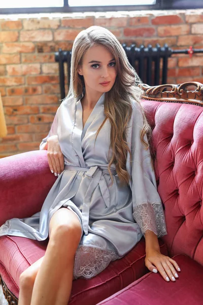 Attractive Sexy Young Blonde Woman Silver Nightgown Sitting Vintage Red — Stockfoto