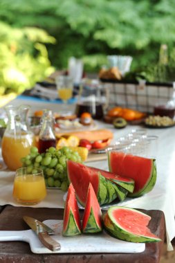 Table full of food and drinks, picnic concept