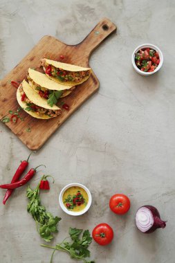 Delicious tacos on the table, fast food concept