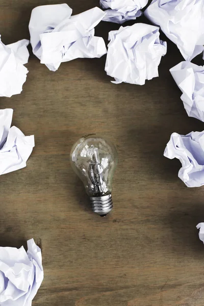 Crumpled Paper Light Bulb Wooden Table — Stock Photo, Image