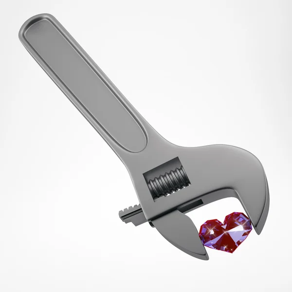 Verstellbarer Schraubenschlüssel mit Rubinherz. — Stockfoto