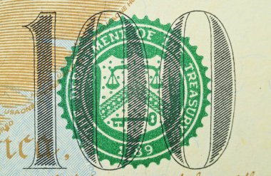 Üzerinde Amerika Maliye Bakanlığı mührü olan 100 dolarlık bir banknot.