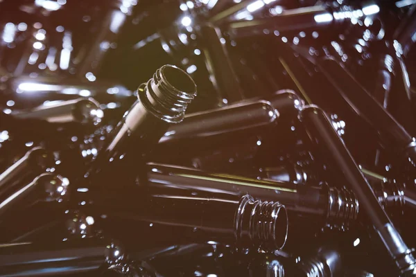 Black preforms for making or blowing plastic bottles in close-up. — Stock Photo, Image
