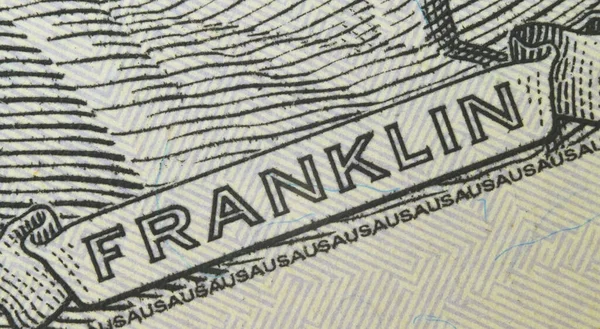 Felirat Franklin szuper közelkép a bankjegyen 100 amerikai dollár egy új minta. — Stock Fotó