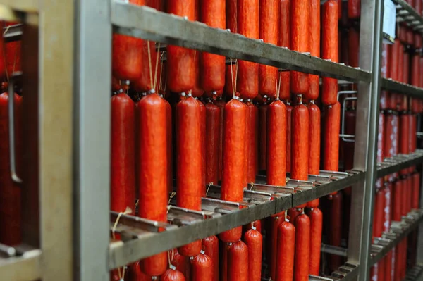 Lot Smoked Sausages Metal Shelves Racks Meat Factory Food Production — Zdjęcie stockowe