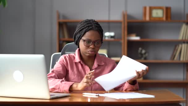 Stressed unmotivated businesswoman crumple documents exhausted sitting at office desk with laptop — Stock Video