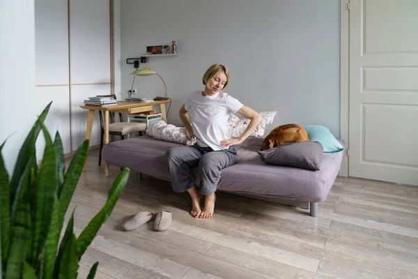 Happy Single Woman Pet Owner Sitting Sofa Dog Smiling Middle — Foto Stock