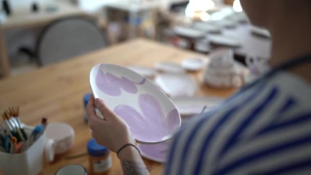 Decorating Pottery Cropped Image Female Artist Hands Holding Paintbrush Drawing — Video Stock