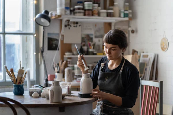 Young Woman Artist Paints White Clay Vase Sitting Table Female — Stok fotoğraf