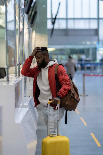 Upset Depressed African American Man Luggage Standing Check Counter Airport — Stockfoto