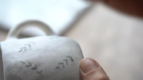 Hands Professional Artisan Hold White Ceramic Mug Drawing Pattern Dark — Video Stock