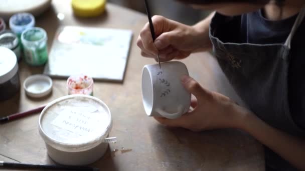 Womans Hands Hold White Ceramic Mug Drawing Creative Patterns Brush — Vídeos de Stock