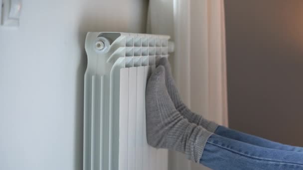 Female Person Puts Feet Grey Woolen Socks Room Central Heating — Stockvideo