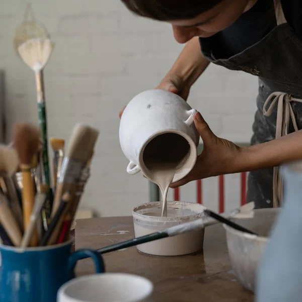 Craftswoman Pours Liquid Clay Leftovers Washing Created Pot Master Prepares — Stock Photo, Image