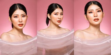 20 'li yaşlarda, Asyalı güzel bir kadının vücut portresi. Siyah saçlı, yüksek moda. Tatlı kız gülümsüyor pembe pastel sabun arka planda pek çok pozun üzerinde uçuyor..