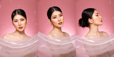 20 'li yaşlarda, Asyalı güzel bir kadının vücut portresi. Siyah saçlı, yüksek moda. Tatlı kız gülümsüyor pembe pastel sabun arka planda pek çok pozun üzerinde uçuyor..
