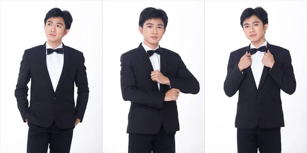 ハーフボディポートレート20代アジアのビジネスマンは ガラディナーのための黒いフォーマルスーツパンツシューズを着用し 会議を祝います 若いスマート男性は幸せな笑顔を感じて自信を立っている 隔離された白い背景 — ストック写真