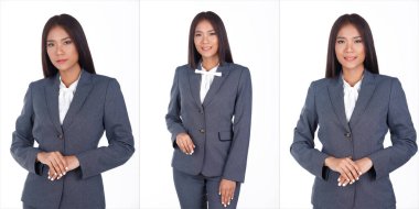 20 'li yaşlardaki Asyalı iş kadınının yarı vücut portresi. Siyah kısa saçlı, beyaz gömlekli, gri pantolonlu. Beyaz arkaplan üzerinde akıllı bir gülümseme hisseden kadın ekspres izole