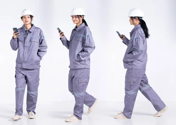 Молодий Інженер Mix Race Електрик Жінка Використовуючи Мобільний Телефон Інтернеті — стокове фото